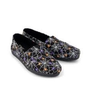 Toms Black Spider Web Slip-Ons
